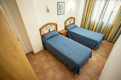 Cama o camas de una habitación en Hotel Apartamentos Mojácar Beach