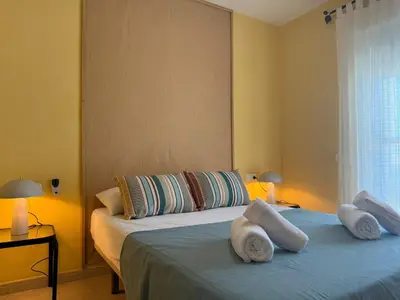 Cama o camas de una habitación en Sunset Beach Front