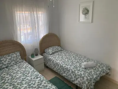 Cama o camas de una habitación en Vistas Al Mar Frente a La Playa Front Line Sea Views