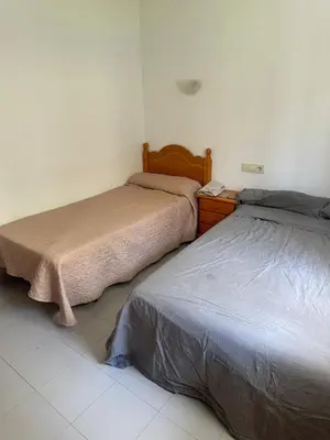 Cama o camas de una habitación en Vera playa Apartamento