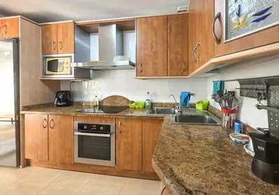 Una cocina o zona de cocina en Apartamento Coto Roquetas de Mar