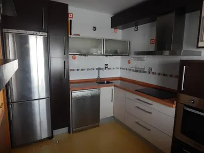 Una cocina o zona de cocina en Apartamento Atico Golf Playa