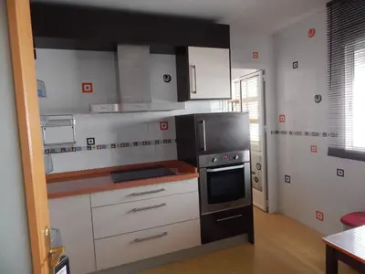 Una cocina o zona de cocina en Apartamento Atico Golf Playa