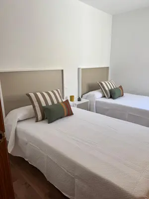 Cama o camas de una habitación en Acogedor apartamento con terraza y vistas al mar
