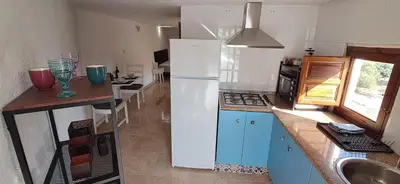 Una cocina o zona de cocina en Casa Tomaddi - House & apartment with private pool & games room
