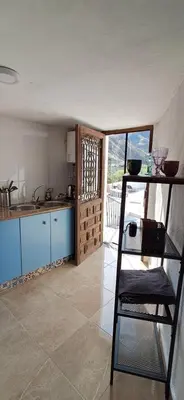 Una cocina o zona de cocina en Casa Tomaddi - House & apartment with private pool & games room