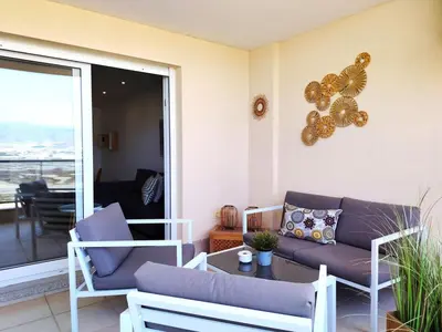 Zona de estar de Mar y Sal 8, 1º Línea de playa, 2 hab, terraza con vistas al mar y garaje