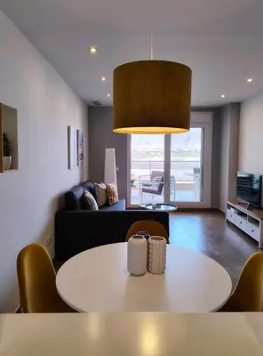 Zona de estar de Mar y Sal 8, 1º Línea de playa, 2 hab, terraza con vistas al mar y garaje