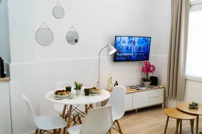 Una televisión o centro de entretenimiento en Elegante loft en Almería con zona de trabajo