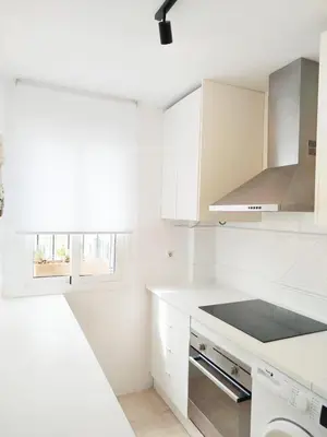 Una cocina o zona de cocina en Ático premium con vistas al mar y a la laguna del Salar