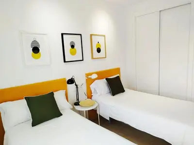 Cama o camas de una habitación en Ático premium con vistas al mar y a la laguna del Salar