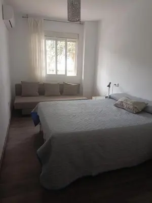 Cama o camas de una habitación en Primera linea playa