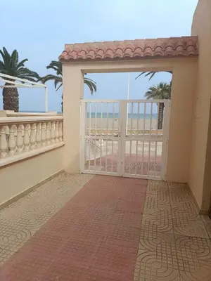 Un balcón o terraza de Primera linea playa