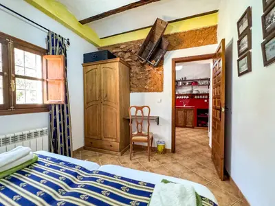 Cama o camas de una habitación en Cortijo Rural Bacares