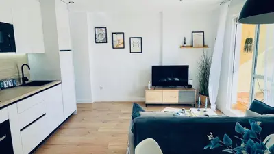 Una televisión o centro de entretenimiento en Apartamento Mirador de la Bahía