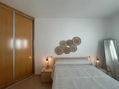 Cama o camas de una habitación en Apartamento con Terrazas y vistas al mar