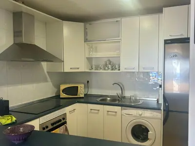 Una cocina o zona de cocina en Apartamento con Terrazas y vistas al mar