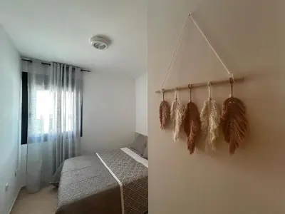 Cama o camas de una habitación en Apartamento con Terrazas y vistas al mar