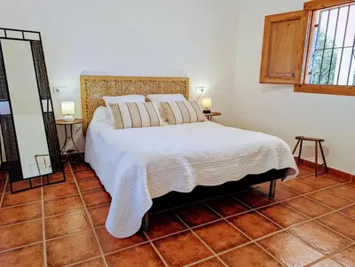 Cama o camas de una habitación en El Cortijo Escondido Ohanes