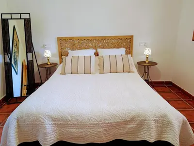 Cama o camas de una habitación en El Cortijo Escondido Ohanes
