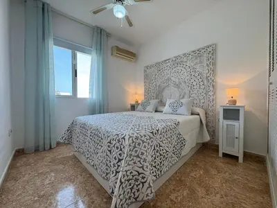Cama o camas de una habitación en Ático Nueva Medina II - Vera Playa
