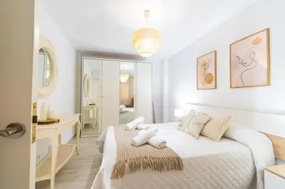 Cama o camas de una habitación en La Brisa del Levante con parking - By Aloha Palma