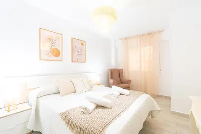 Cama o camas de una habitación en La Brisa del Levante con parking - By Aloha Palma