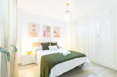 Cama o camas de una habitación en La Brisa del Levante con parking - By Aloha Palma
