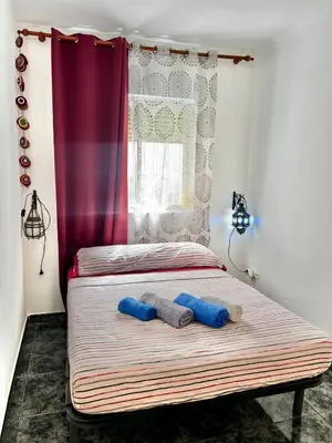 Cama o camas de una habitación en Casa Andaluza