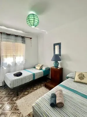 Cama o camas de una habitación en Casa Andaluza