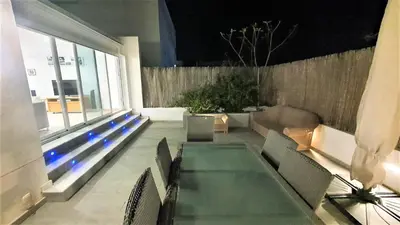 Zona de estar de Precioso bajo en El Toyo