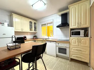 Una cocina o zona de cocina en Premium Apartment in Roquetas de Mar