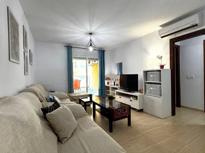 Una televisión o centro de entretenimiento en Premium Apartment in Roquetas de Mar