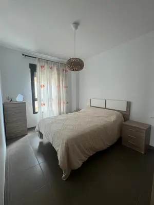 Cama o camas de una habitación en Costa & Confort Apartamentos