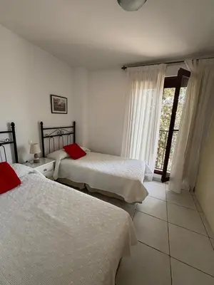 Cama o camas de una habitación en Apartamento en primera línea de playa Jardines de Nuevo Vera, Vera Playa, Almeria