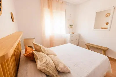 Cama o camas de una habitación en Bohemian apartment with pool 180m from Mojacar beach