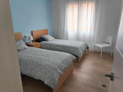 Cama o camas de una habitación en Apartamento La Casica Beach Poniente