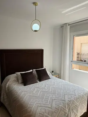 Cama o camas de una habitación en Piso acogedor con vistas al mar