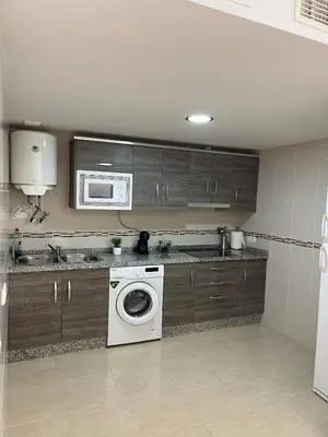 Una cocina o zona de cocina en Piso acogedor con vistas al mar