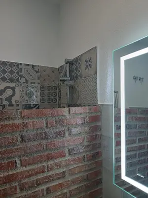 Un baño de La Troje Pensión