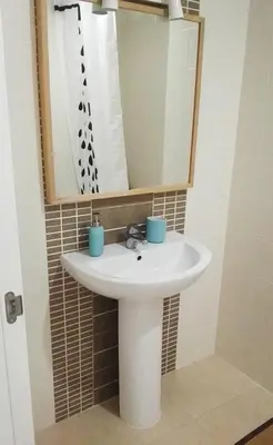 Un baño de Apartamento a 200 m del mar con piscina y padel