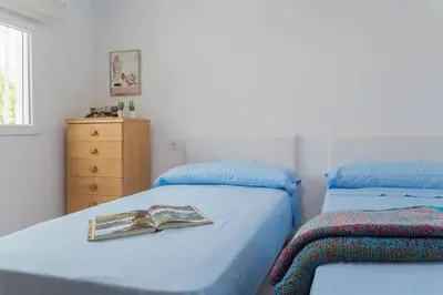 Cama o camas de una habitación en Casa en Almería