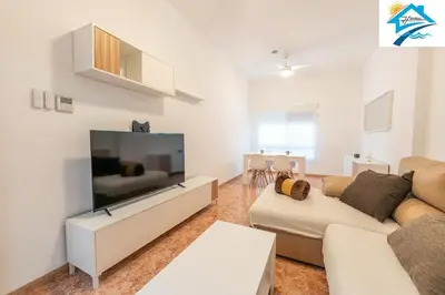 Una televisión o centro de entretenimiento en Apartment F1 Aguadulce