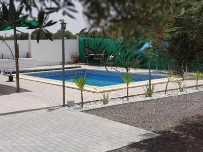 Piscina en o cerca de Oasis Pool in the Desert BBQ and Garden