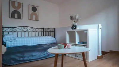Cama o camas de una habitación en La Suerte Apartamento rural