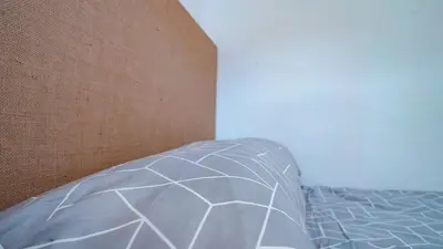 Cama o camas de una habitación en La Suerte Apartamento rural