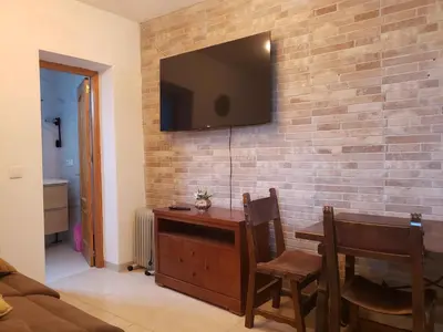 Una televisión o centro de entretenimiento en cortijo el pedregal