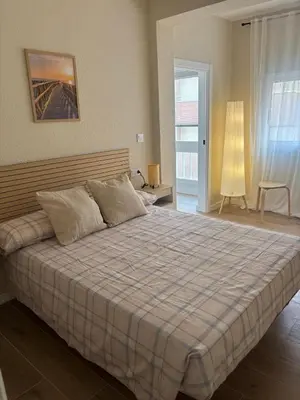 Cama o camas de una habitación en CAPRI Almería Playa - AC