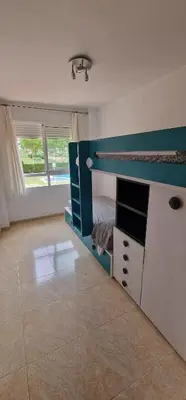 Una cocina o zona de cocina en Piso con piscina en Aguilas Murcia