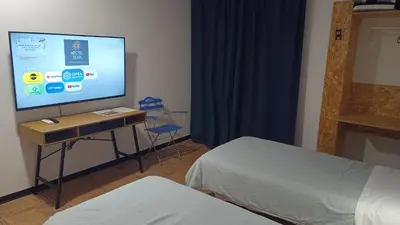 Una televisión o centro de entretenimiento en Hostel Elios